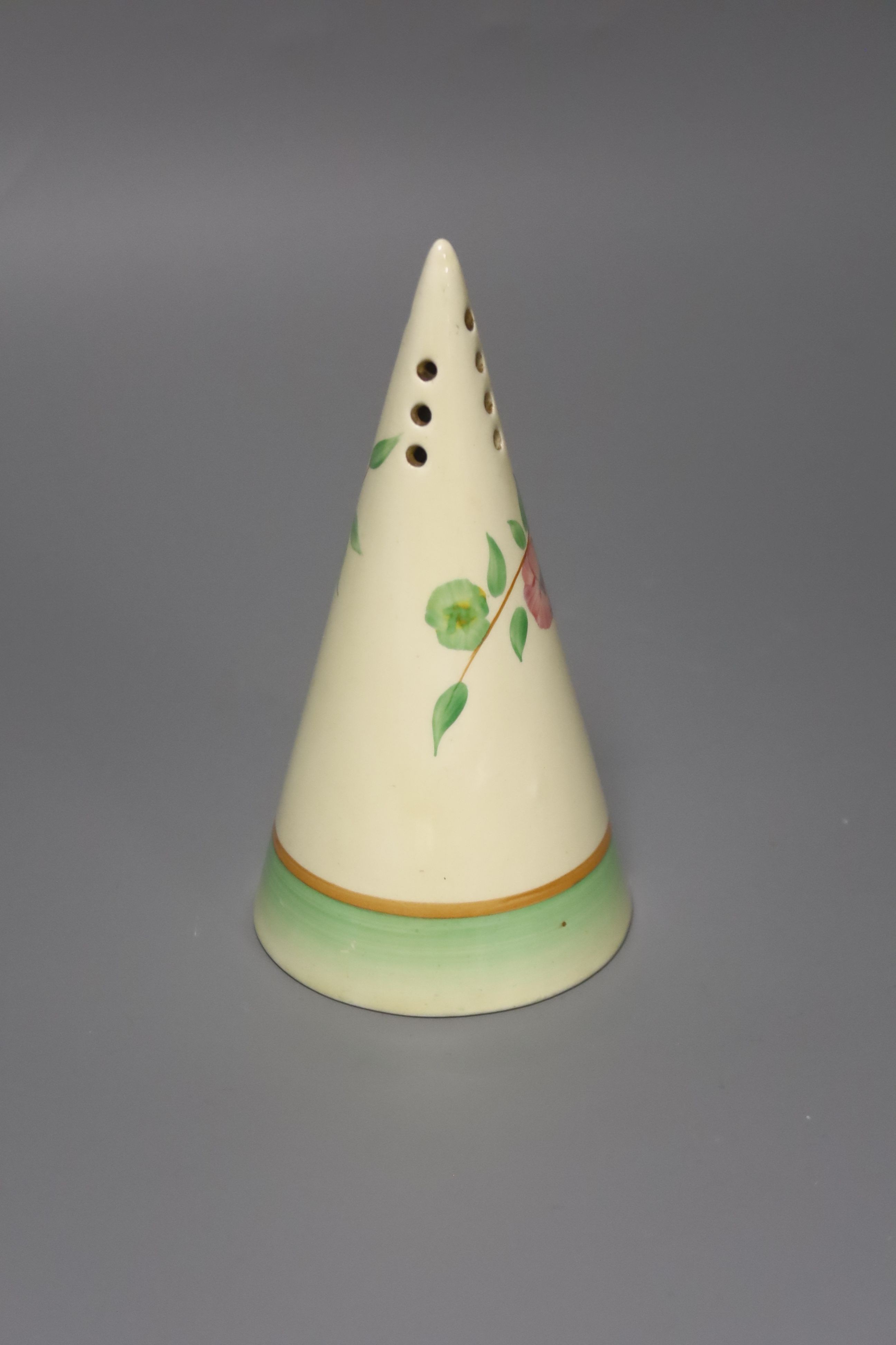 A Clarice Cliff conical shaped sugar sifter, 14cm